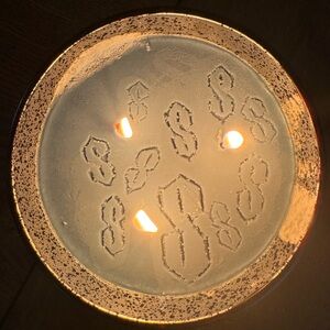 Decorative Candle with Dollar Sign Design